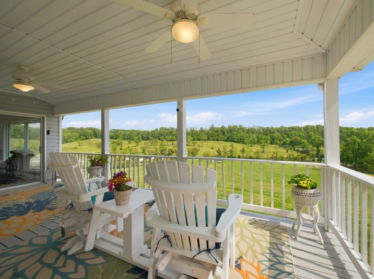 Covered deck with sweeping valley views