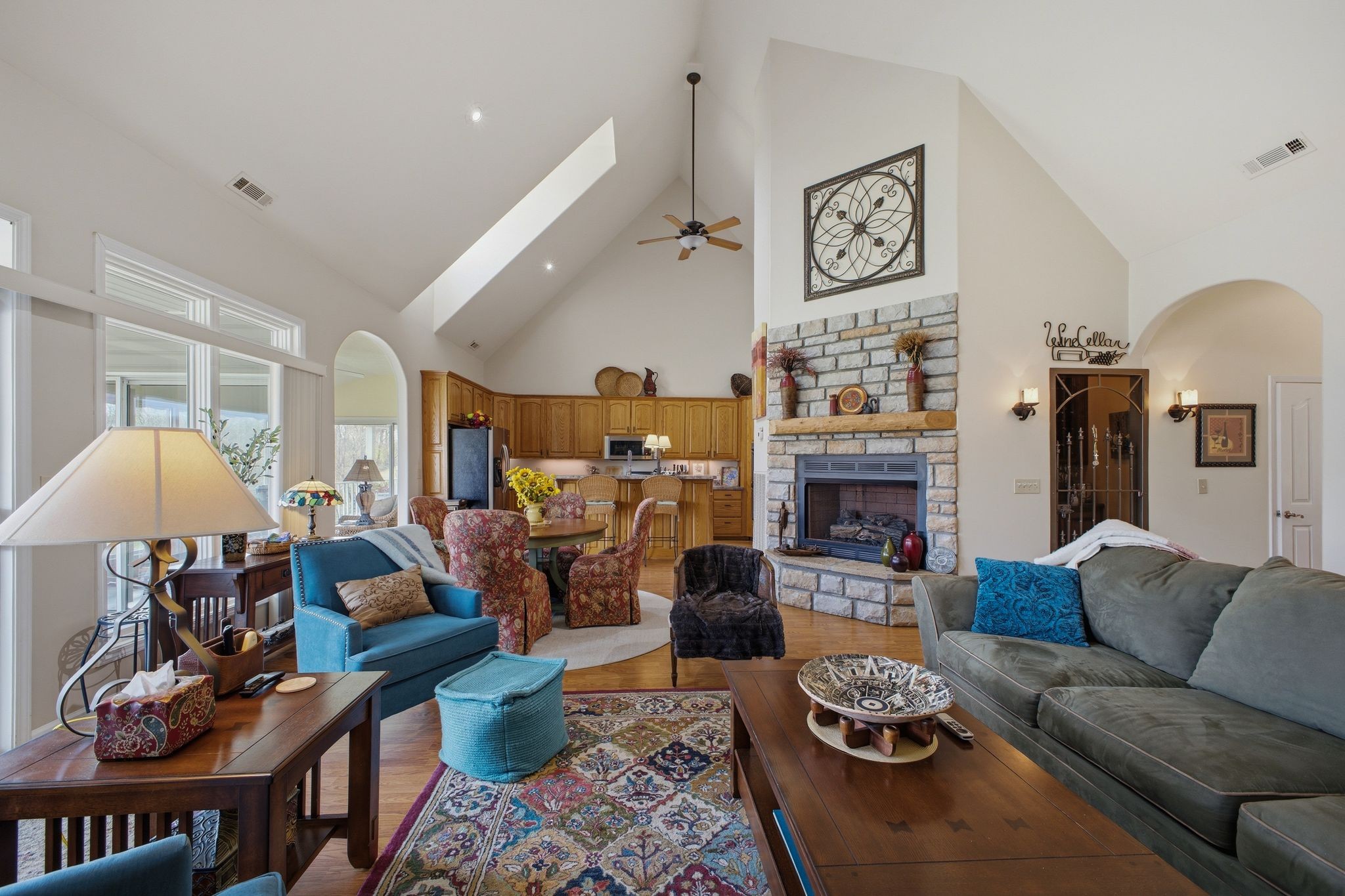 Open-concept great room, kitchen, and fireplace