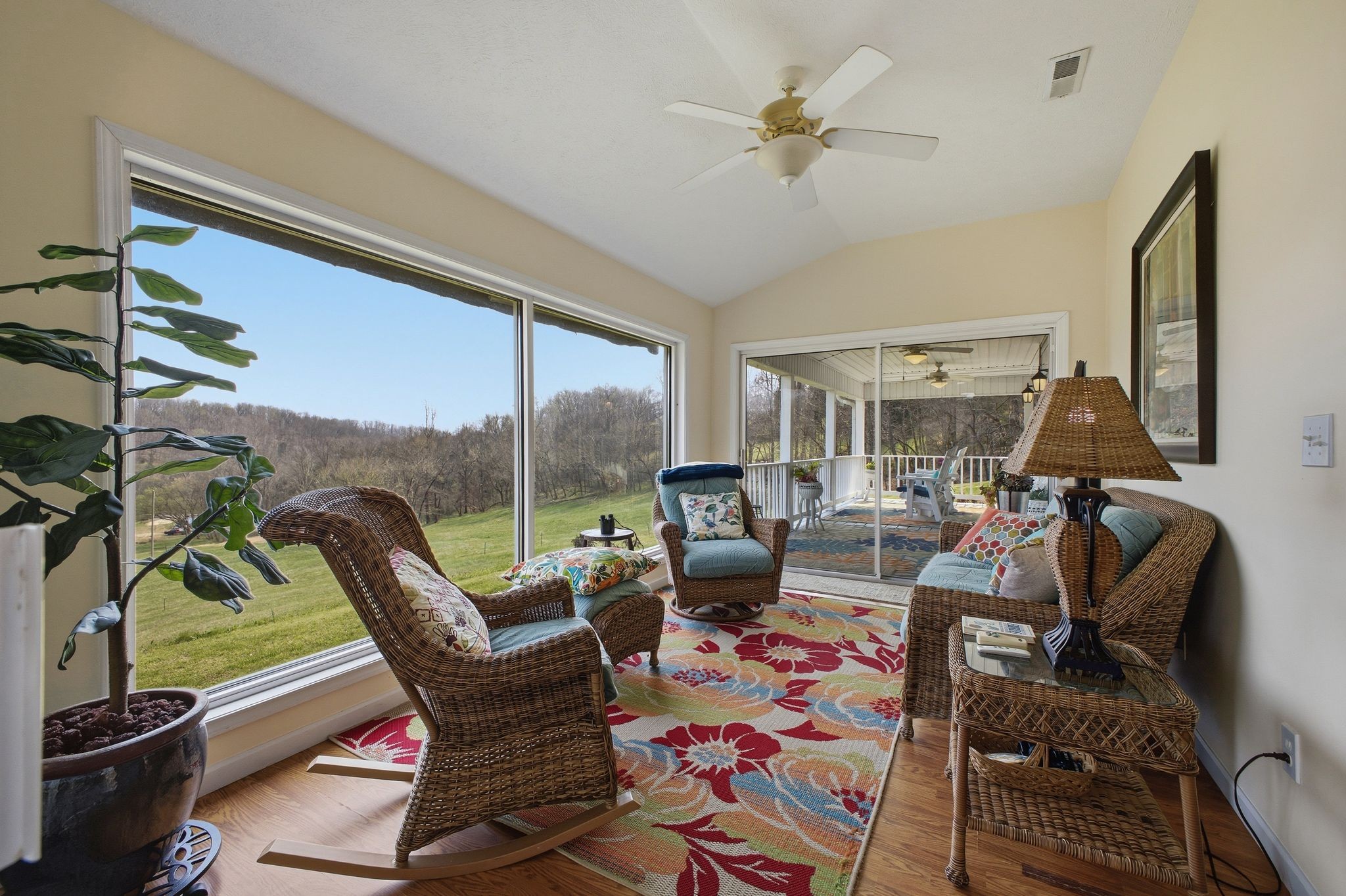 Sun-filled Florida room overlooking pastures