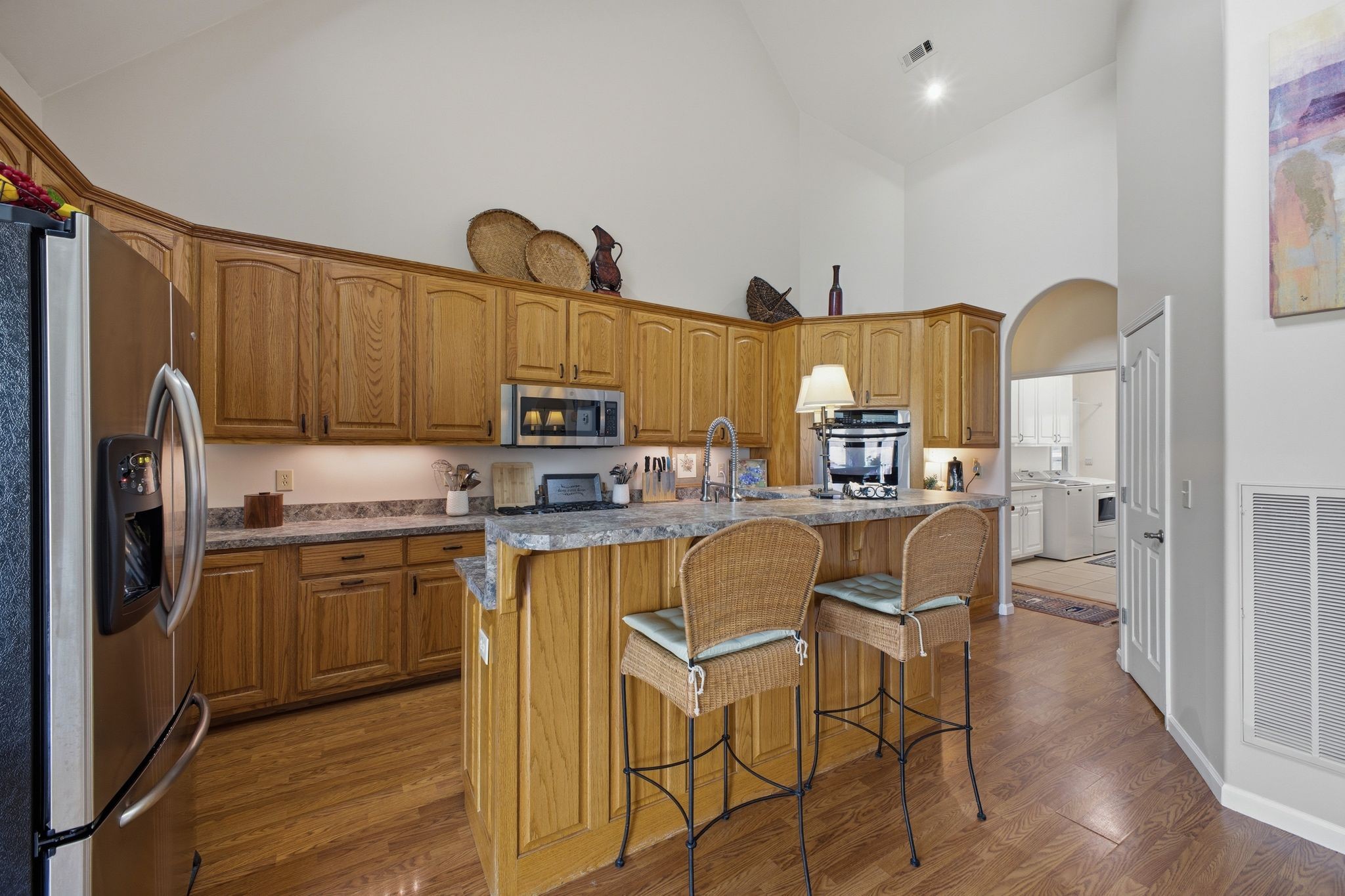 Kitchen with island and stainless appliances