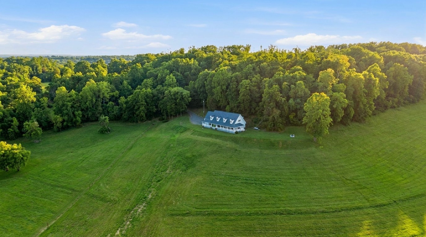 391 Keg Springs Rd — aerial view at golden hour, 40 rolling acres