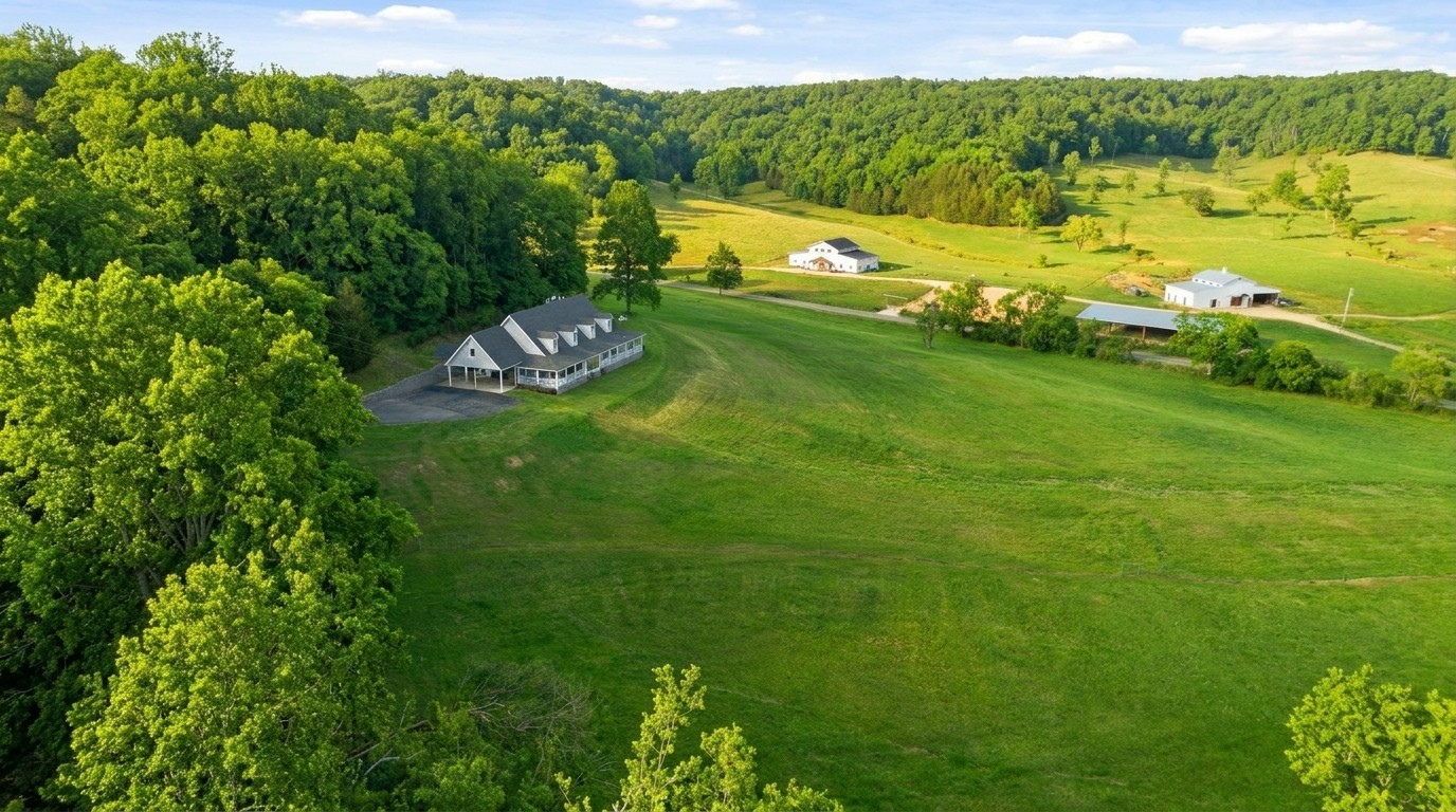 Aerial view showing home, shop, and outbuildings